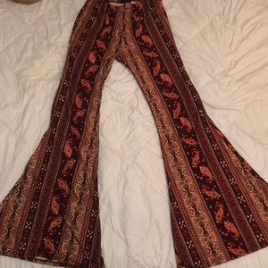 Paisley reddish brown orange flare pants.